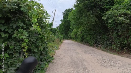 Gravel bicycle ride on the road in the summer season