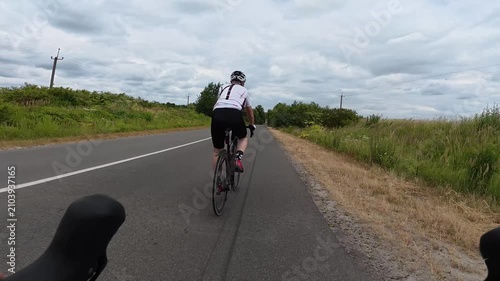 Gravel bicycle ride on the road in the summer season