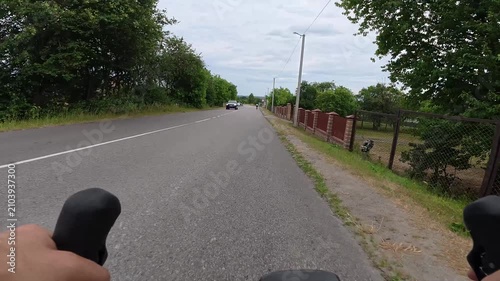 Gravel bicycle ride on the road in the summer season