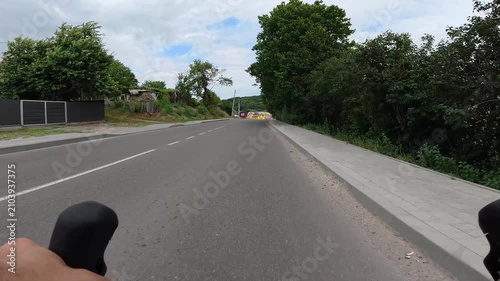 Gravel bicycle ride on the road in the summer season