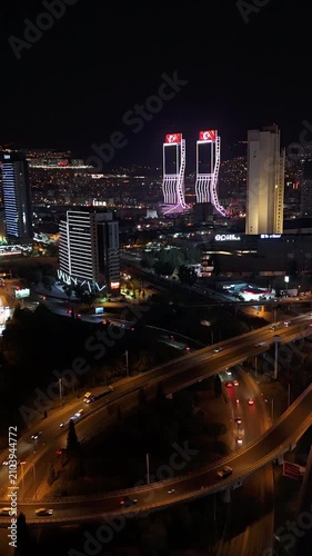 Nighttime drone view of the city – Skyscrapers and traffic