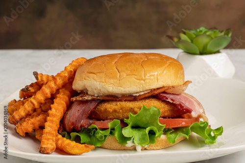 chicken fillet blt  sandwich with sweet potato fries