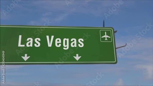 Las Vegas airplane landing. Jet plane travel to Nevada USA, United States arrival with airport signboard.