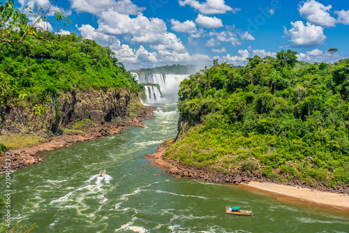 фотографія Scenic view of a powerful waterfall in the lush tropical rainforest of Brazil wi