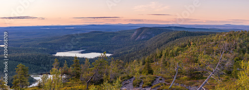 Breathtaking summer sunset over Valtavaara landscape in Kuusamo, Finland