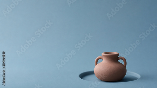 Abstract amphora form on soft matte publishing background