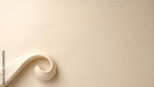 Sculptural scroll relief on warm interior design background