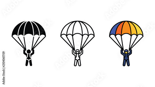 Obraz na płótnie Three parachuters with different colored parachutes in mid air descent
