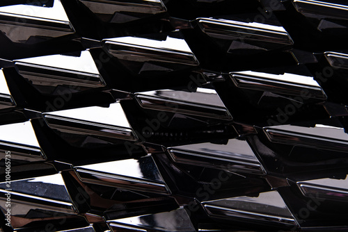 Glossy Black Car Front Grille Pattern Texture Close Up For Automotive Background
