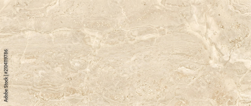 Cream marble surface featuring soft natural veining with warm ivory tones and a smooth polished stone pattern design
