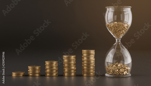 Obraz na płótnie 節約の金貨と砂時計で表す資産形成イメージ写真