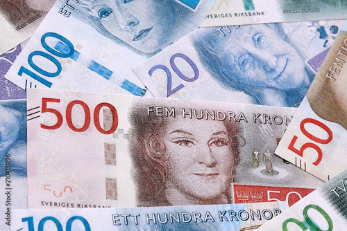 Картината върху платно Swedish krona money bills pile on table