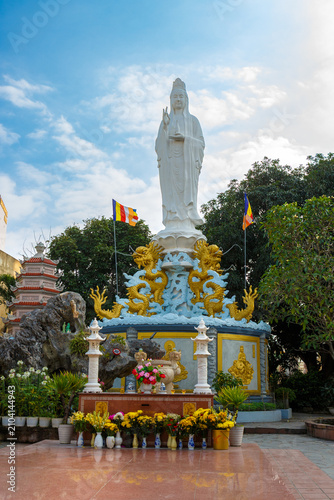 Bild auf Leinwand Buddha Mercy Goddess Guanyin Bodhisattva decorated with golden dragons at My Khe Pagoda in Danang