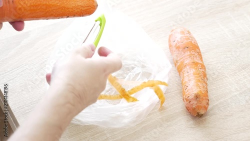 Peeling Fresh Carrots During Food Preparation in Home Kitchen, 4K