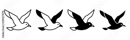 Set of Four Seagull Silhouette Icons in Flight.
