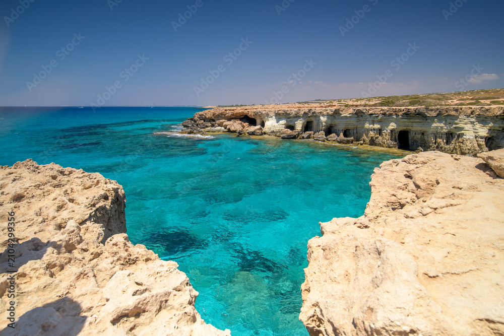 Fototapeta premium Rocky Mediterranean Coastline on a Sunny Day in Cyprus