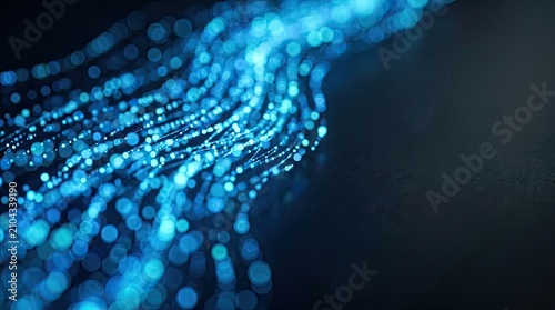 Abstract Blue Light Bokeh Background. Glowing Digital Particles for Technology and Data Flow Concepts.