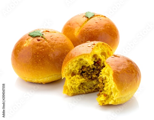 Curry buns on white.