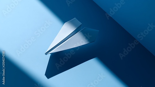 Minimalist paper airplane soaring on a vibrant blue background with dramatic shadows, symbolizing new ideas and communication