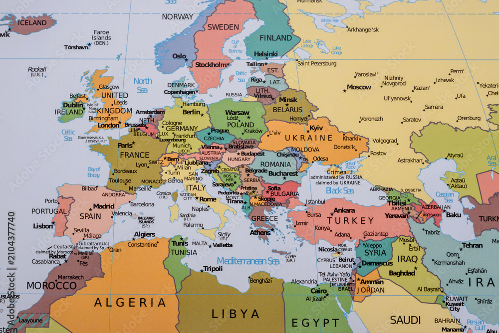 Obraz premium A global world map as a backdrop for themes of trips, travel, hiking, or relocation. A world map