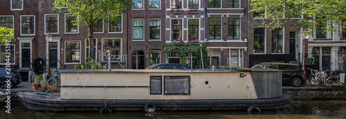 Photography Traditional Dutch houseboat on Bloemgracht canal in Amsterdam’s Jordaan district in Amsterdam, Netherlands 06