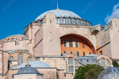 Hagia Sophia Grand Mosque in Istanbul, Turkey. Famous historical Byzantine cathedral and landmark under clear blue sky