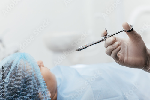 Slika na platnu Local anesthetic injection before dental procedure in a professional dental offi