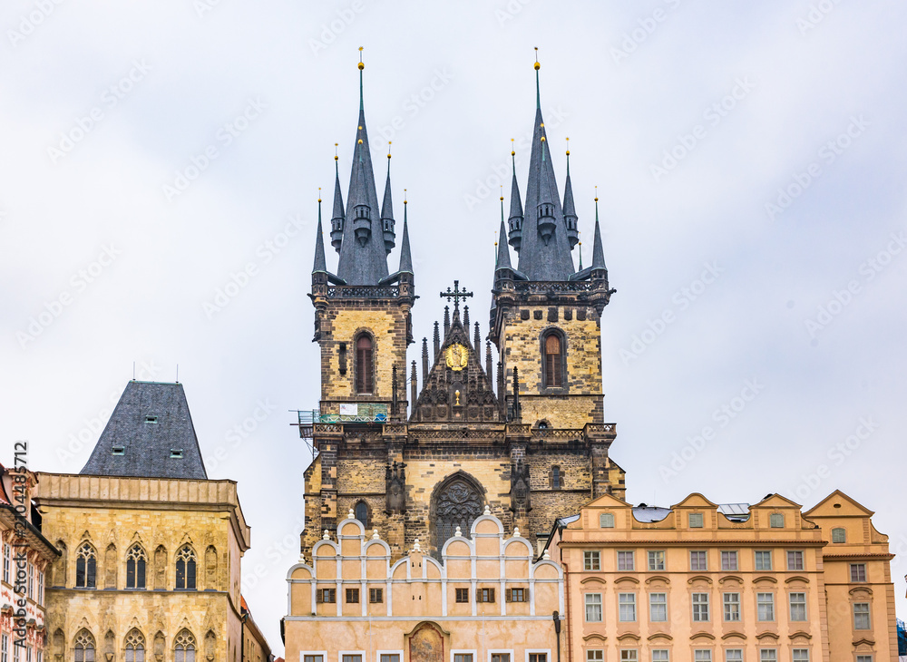 Fototapeta premium Close up view of the magnificent Gothic spires of the Church of Our Lady before Tyn in the UNESCO World Heritage site of Prague.