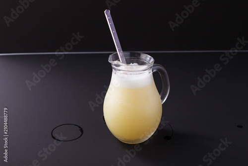Refreshing rice wine makgeolli in a glass pitcher