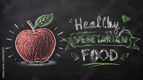 Chalkboard apple illustration with healthy vegetarian food text