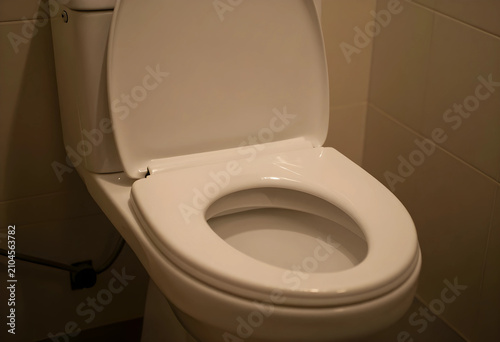 White ceramic toilet with a...