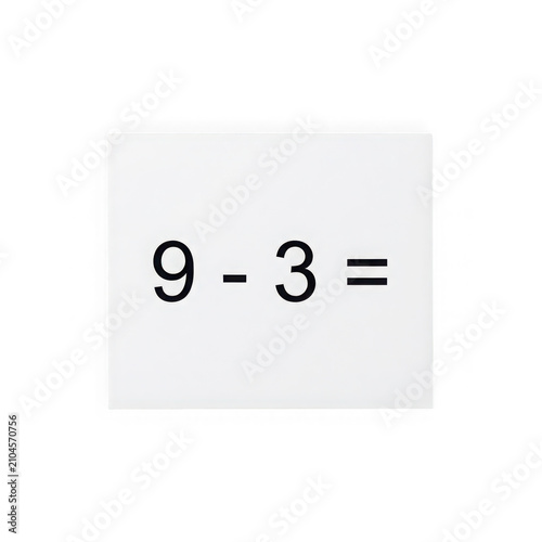 Simple math subtraction equation nine minus three written in black text