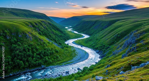 A panoramic high-angle view of a natural watershed basin where mountain streams flow through a lush green valley toward a winding river, outdoor, topography, wild