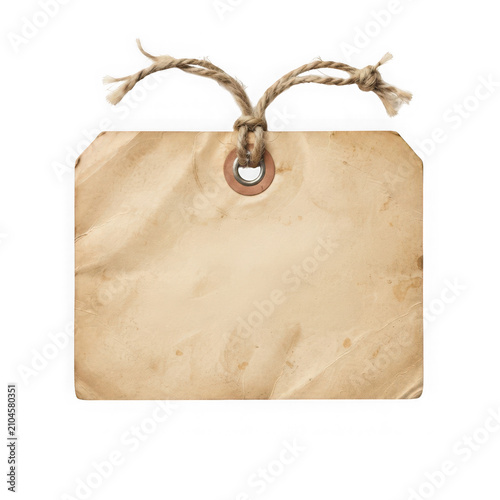 Old vintage paper tag with a piece of twine string for price or gift label
