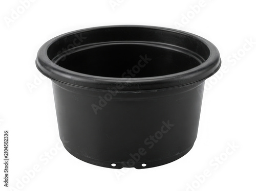Empty black plastic flower pot for gardening and planting