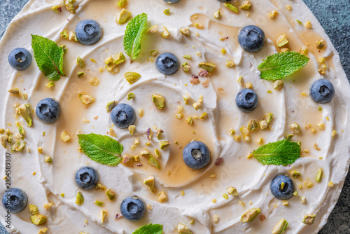 Rustic No Bake Mascarpone Cheesecake Topped With Blueberries Pistachios Maple Syrup And Mint