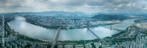 Panoramic Seoul, Han river and skyline under storm clouds viewed from Seoul Sky Lotte World Tower