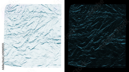 Foto Crumpled plastic wrap texture on white and black backgrounds, wrinkled transpare