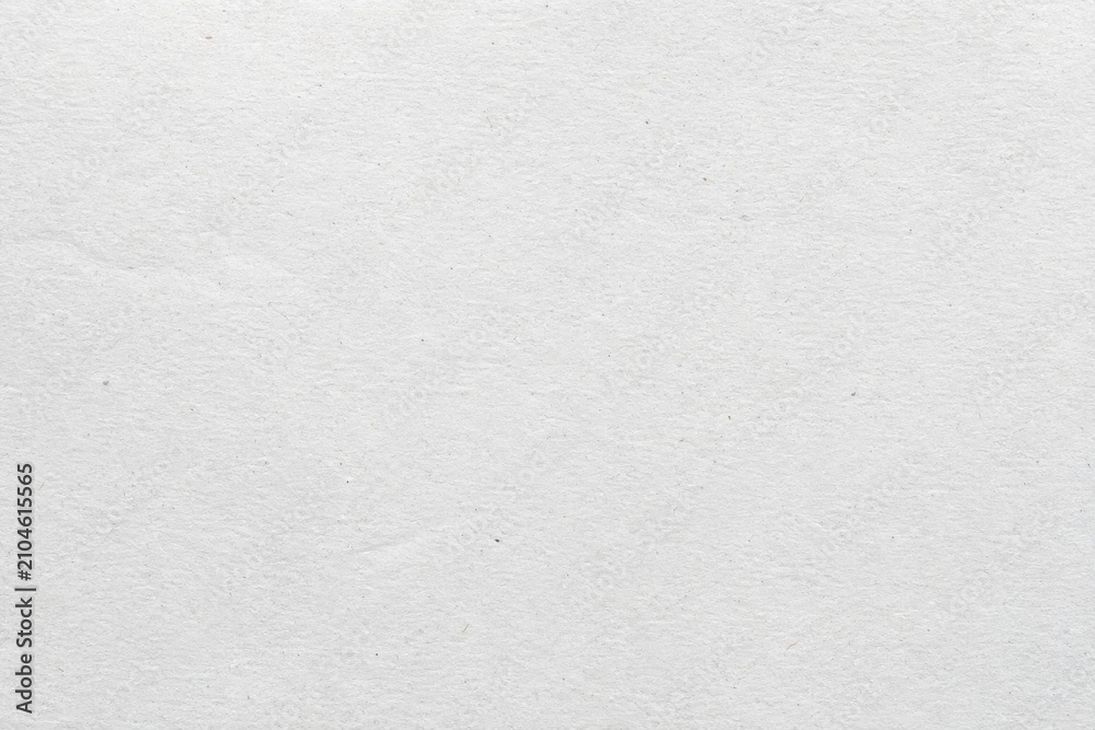 Fototapeta premium Pristine Paper Surface Background. A detailed view of white, fibrous material showcasing its natural grain. This immaculate, pure canvas symbolizes new beginnings and creative potential.