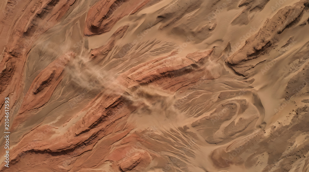 Obraz premium Striking desert terrain sculpted by wind and sand showcasing dramatic geological formations and arid beauty.