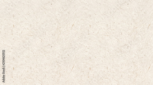 Close-up of pale bleached kraft paper texture background. Natural uncoated recycled packaging material surface for design mockups.