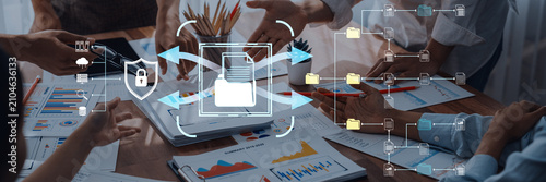 Fotografija Team Collaborates on Data Security Strategy with Graphs and Diagrams to Ensure Safe Information Exchange in Modern Business Environment