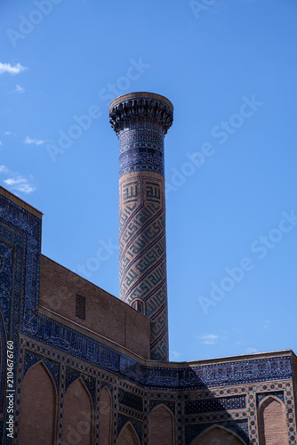 Ornate Islamic Minaret with Blue Tile Mosaic in Samarkand