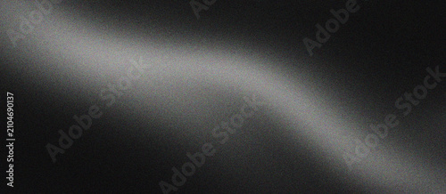 Photography Minimalist black brushed metal texture with soft light reflection, industrial dark steel background for luxury product display, sleek charcoal metallic surface with elegant curved highlight