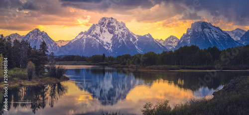 Gran Teton, Wiyoming, Mountains Reflecting in Lake at Sunset, Serene Landscape High quality commercial imagery suitable for marketing, advertising, editorial use, and profe