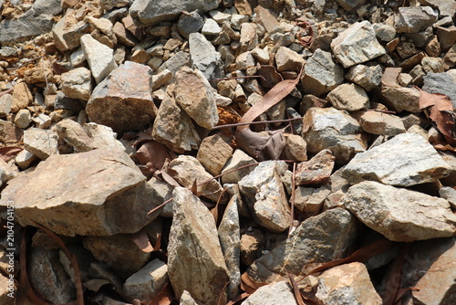 Bild auf Leinwand Heap of natural rocks and broken stones collected for landscaping and constructi