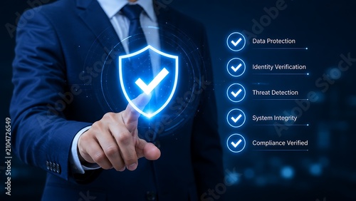 Businessman touching a digital shield icon with check mark for security