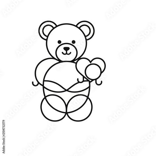 Teddy bear holding a heart