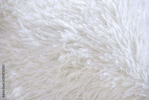 In selective focus shot of a white rug or white carpet for background backdrop