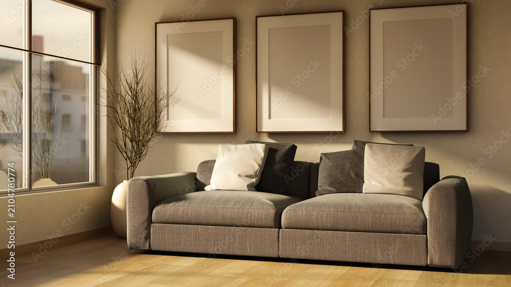Fototapeta premium Cozy living room featuring grey sofa and empty picture frames.